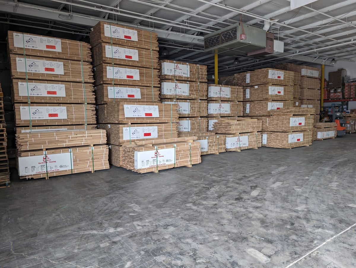 A hardwood floor being installed by Forever Flooring